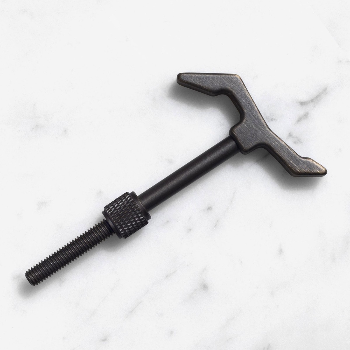 The Hook Cast in Solid Brass with Smoked Bronze Finish